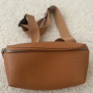 Monos Vegan Leather Metro Sling in Saddle Tan